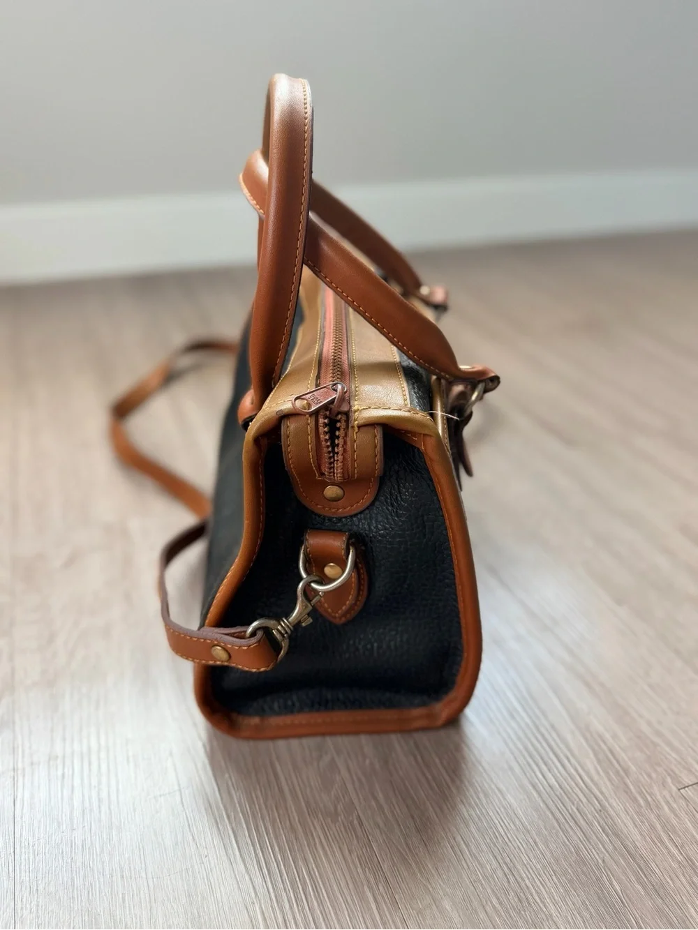 Dooney & Bourke Black with Brown Trim Leather Satchel Purse